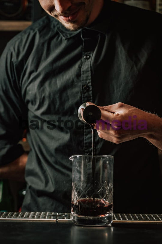 Dark and Moody Jigger Pour for Stirred Cocktail