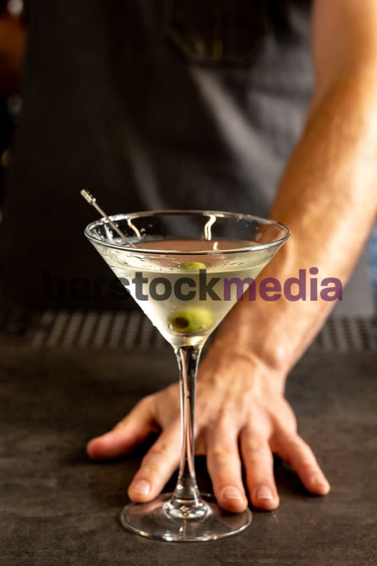 Martini Being Served by Bartender
