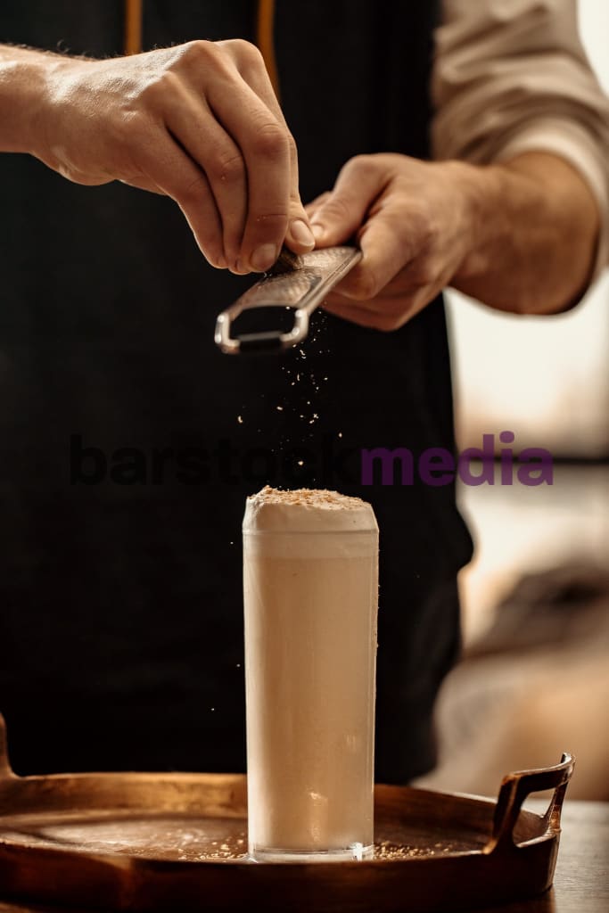 Holiday Gin Fizz with Grated Nutmeg-Bar Stock Photos